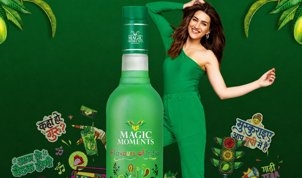 Magic Moments campaign showing a woman in green beside an Aam Panna flavoured bottle.
