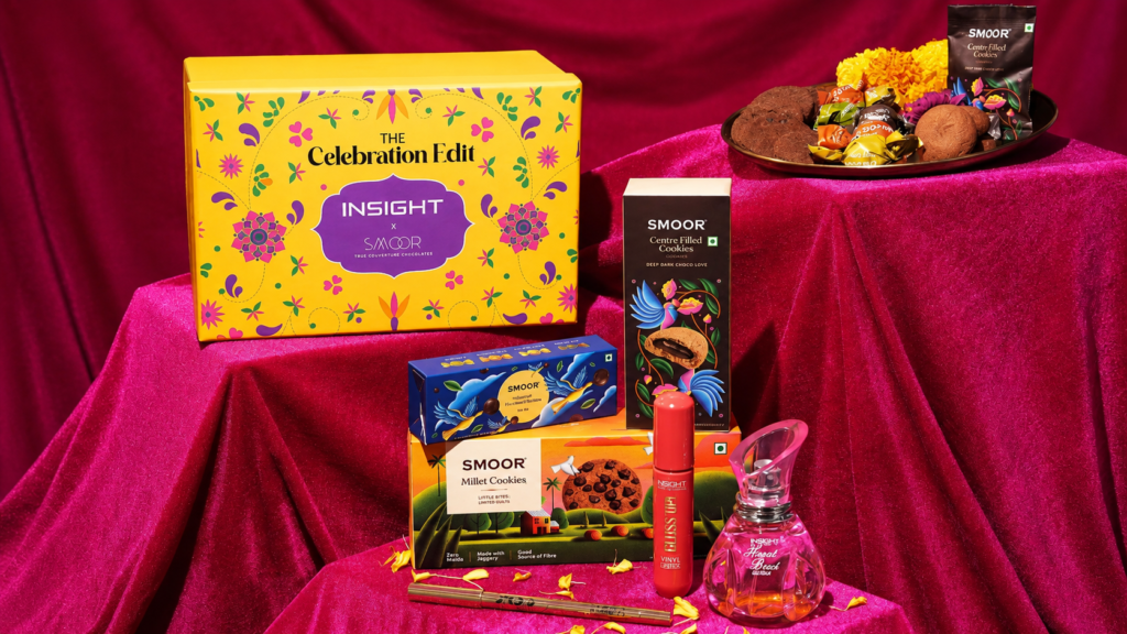 Insight Cosmetics, Zepto and Smoor Rakhi campaign product display on pink fabric.