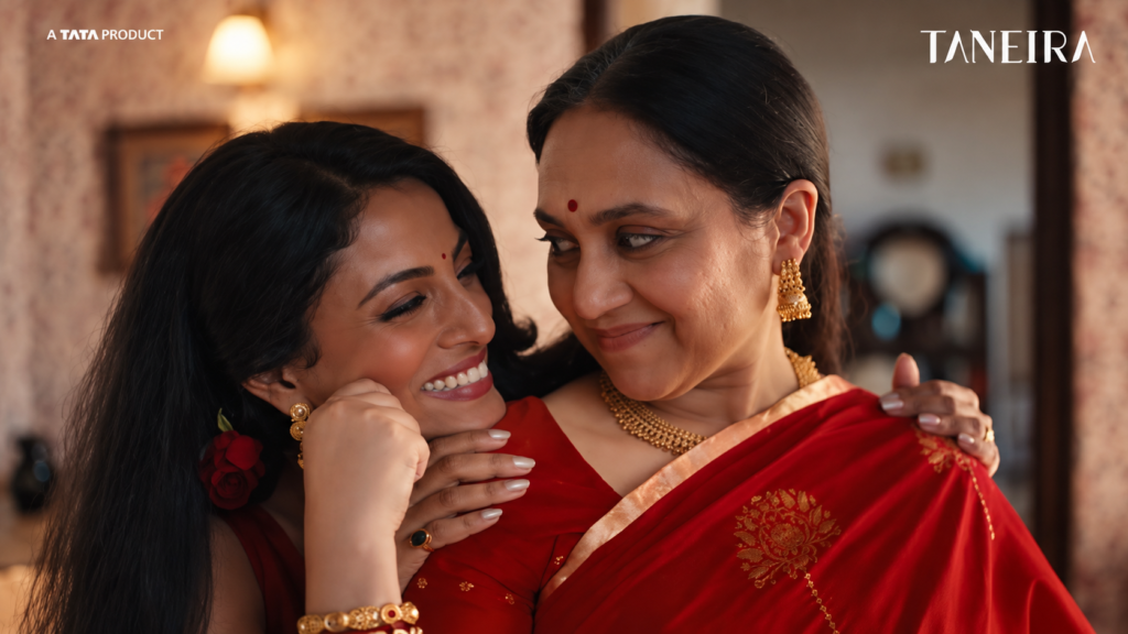 Taneira Durga Pujo campaign showing a mother and daughter together in sarees.