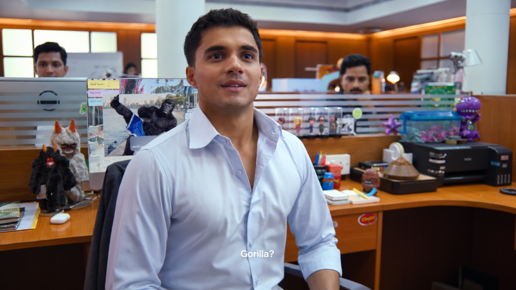 ChatGPT Work campaign showing an employee in a busy office.